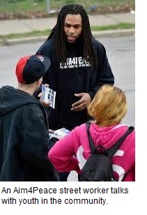 Street Worker Interacts with Youth